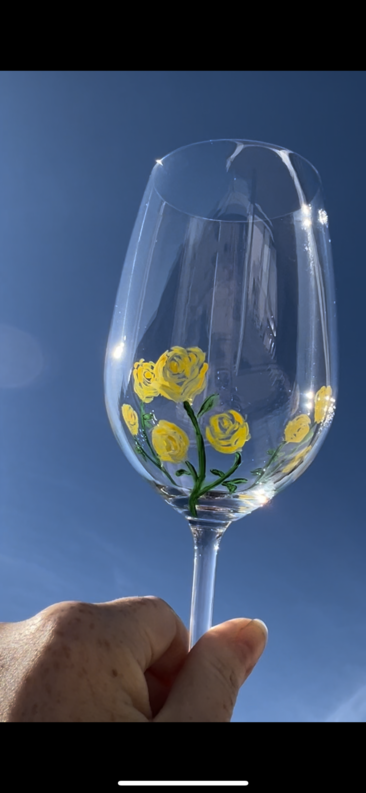 Wine glass yellow roses